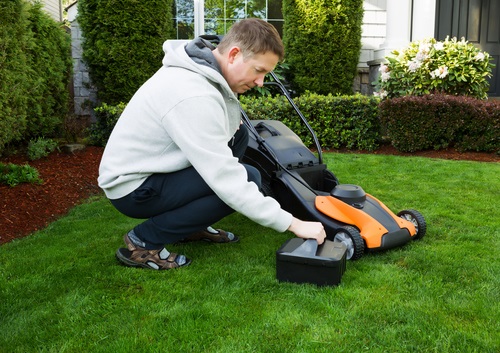 Lawn mower and battery charger